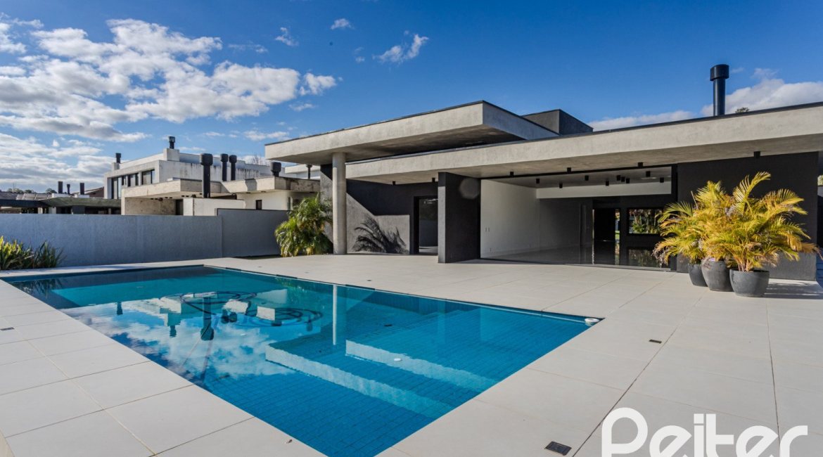 Casa em Condomínio à venda com 392m², 4 dormitórios, 4 suítes, 4 vagas, no bairro Terra Ville em PORTO ALEGRE
