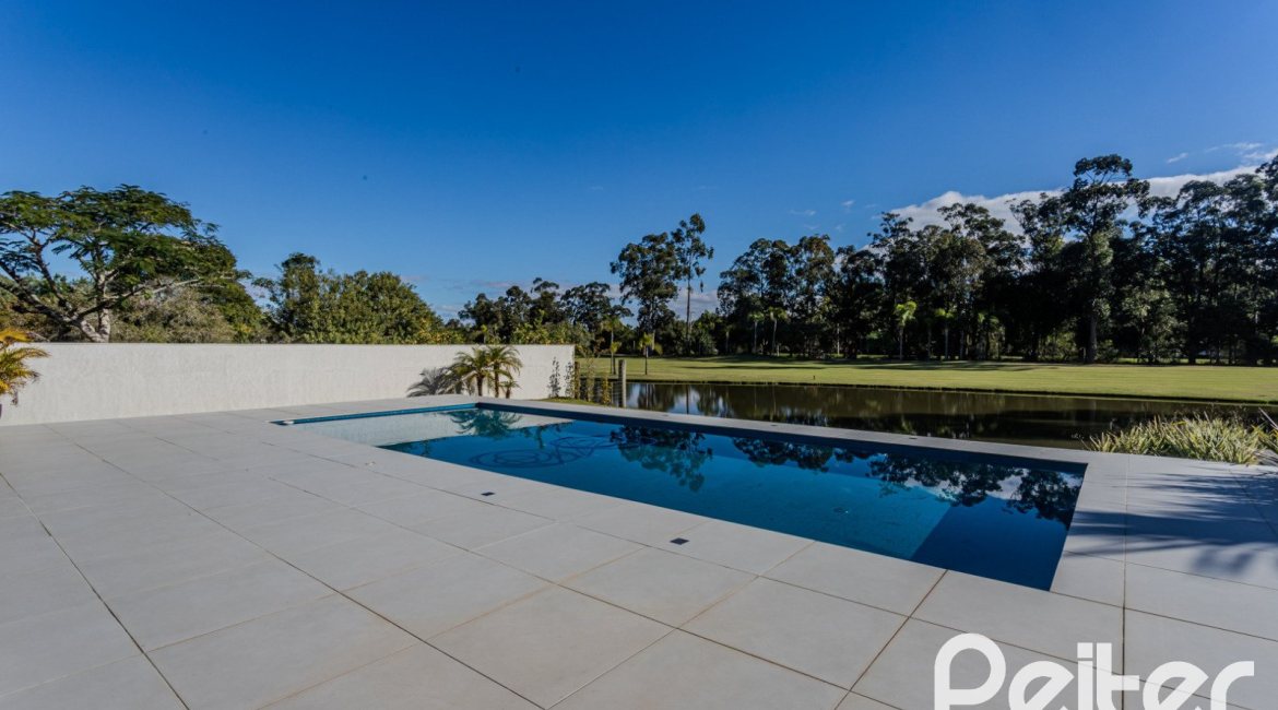 Casa em Condomínio à venda com 392m², 4 dormitórios, 4 suítes, 4 vagas, no bairro Terra Ville em PORTO ALEGRE