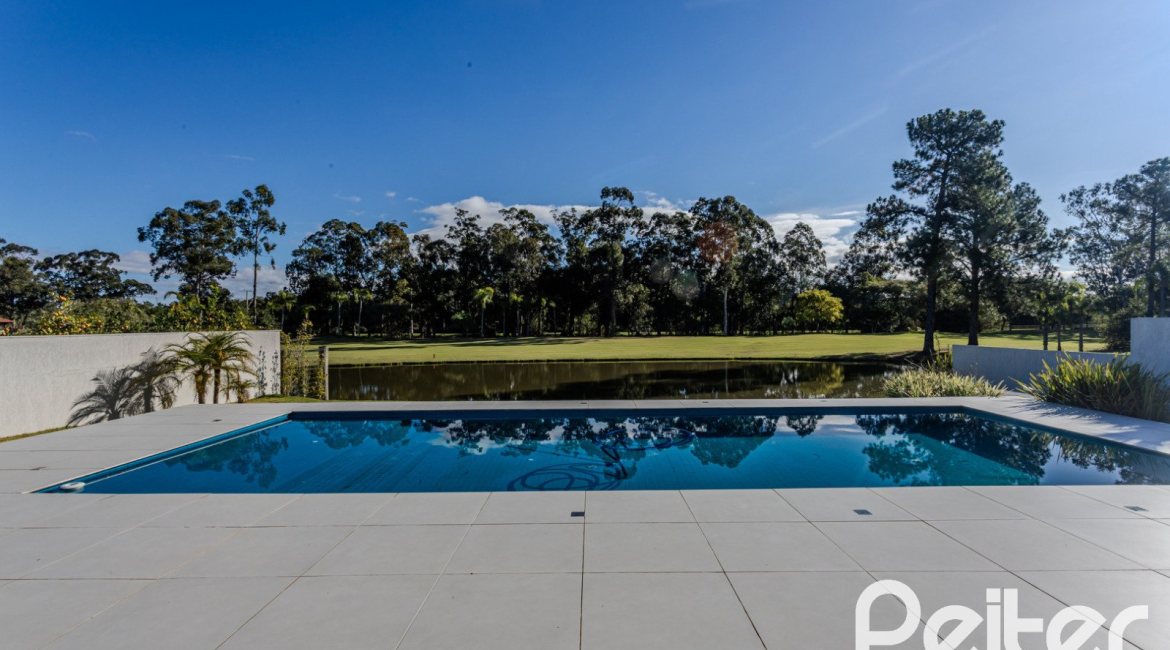 Casa em Condomínio à venda com 392m², 4 dormitórios, 4 suítes, 4 vagas, no bairro Terra Ville em PORTO ALEGRE