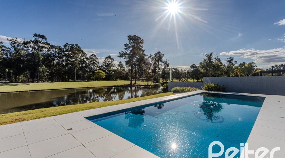Casa em Condomínio à venda com 392m², 4 dormitórios, 4 suítes, 4 vagas, no bairro Terra Ville em PORTO ALEGRE
