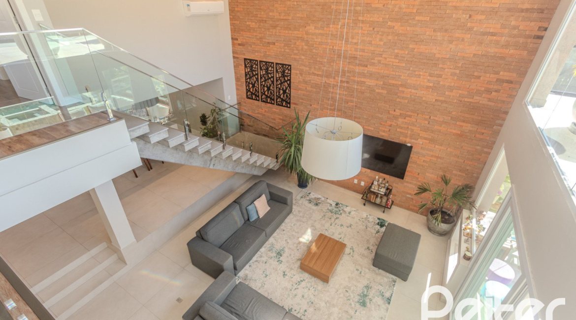 Casa em Condomínio à venda com 340m², 3 dormitórios, 3 suítes, 4 vagas, no bairro Alphaville em PORTO ALEGRE