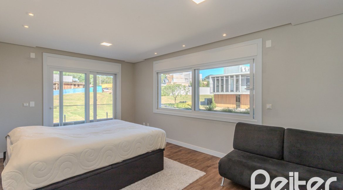 Casa em Condomínio à venda com 340m², 3 dormitórios, 3 suítes, 4 vagas, no bairro Alphaville em PORTO ALEGRE