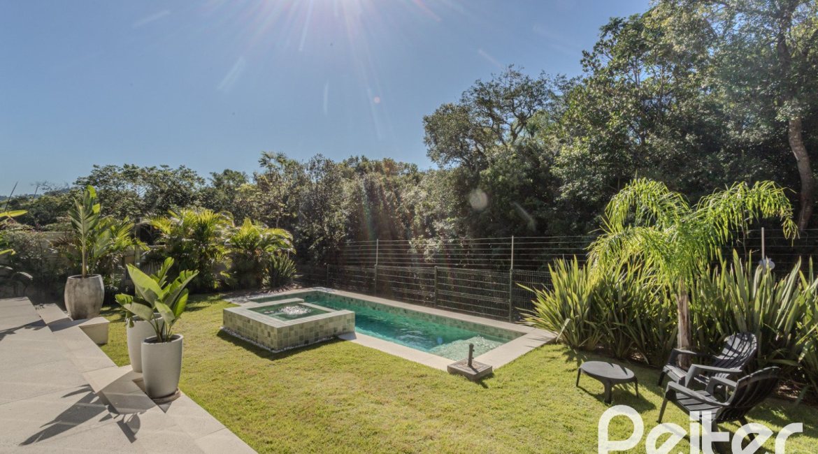 Casa em Condomínio à venda com 340m², 3 dormitórios, 3 suítes, 4 vagas, no bairro Alphaville em PORTO ALEGRE