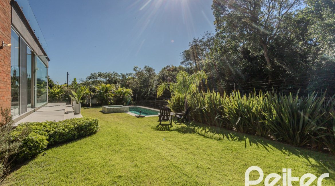 Casa em Condomínio à venda com 340m², 3 dormitórios, 3 suítes, 4 vagas, no bairro Alphaville em PORTO ALEGRE