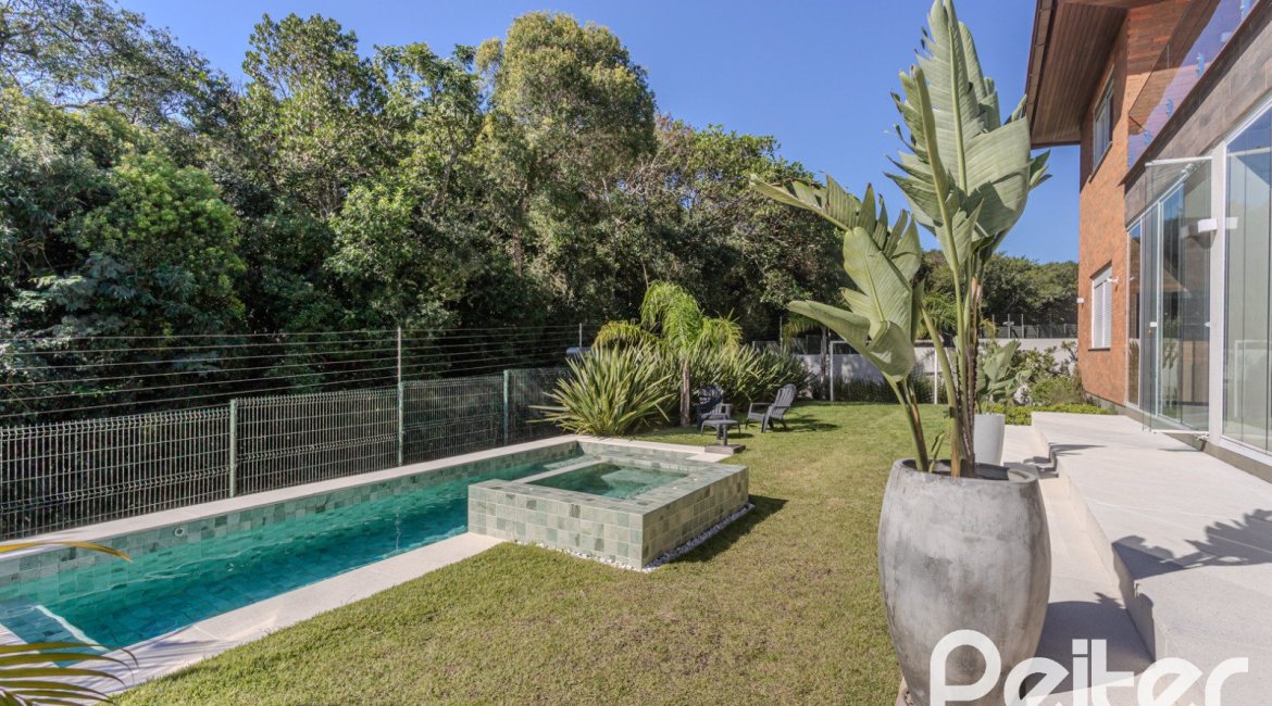 Casa em Condomínio à venda com 340m², 3 dormitórios, 3 suítes, 4 vagas, no bairro Alphaville em PORTO ALEGRE