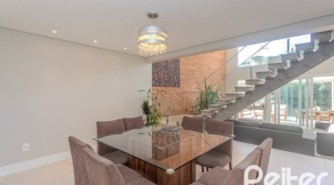 Casa em Condomínio à venda com 340m², 3 dormitórios, 3 suítes, 4 vagas, no bairro Alphaville em PORTO ALEGRE