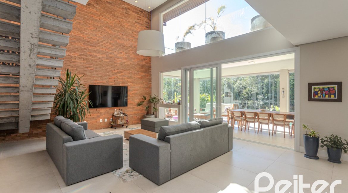 Casa em Condomínio à venda com 340m², 3 dormitórios, 3 suítes, 4 vagas, no bairro Alphaville em PORTO ALEGRE