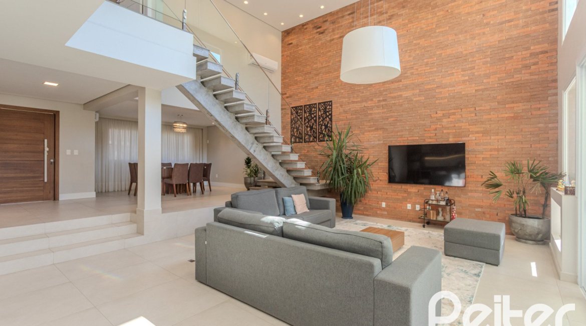 Casa em Condomínio à venda com 340m², 3 dormitórios, 3 suítes, 4 vagas, no bairro Alphaville em PORTO ALEGRE