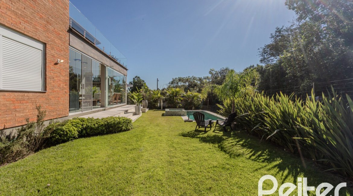 Casa em Condomínio à venda com 340m², 3 dormitórios, 3 suítes, 4 vagas, no bairro Alphaville em PORTO ALEGRE