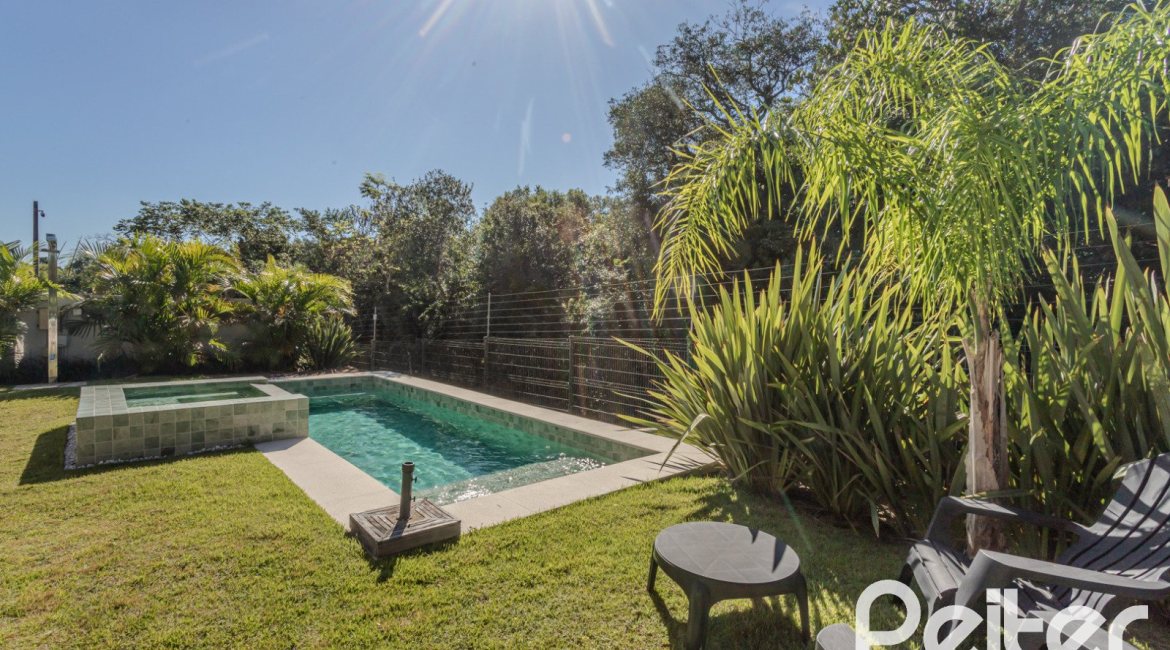 Casa em Condomínio à venda com 340m², 3 dormitórios, 3 suítes, 4 vagas, no bairro Alphaville em PORTO ALEGRE