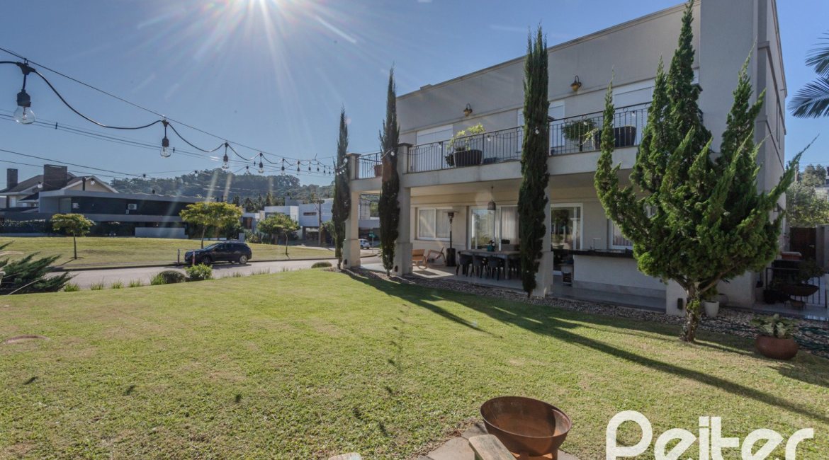 Casa em Condomínio à venda com 441m², 4 dormitórios, 4 suítes, 3 vagas, no bairro Alphaville em PORTO ALEGRE