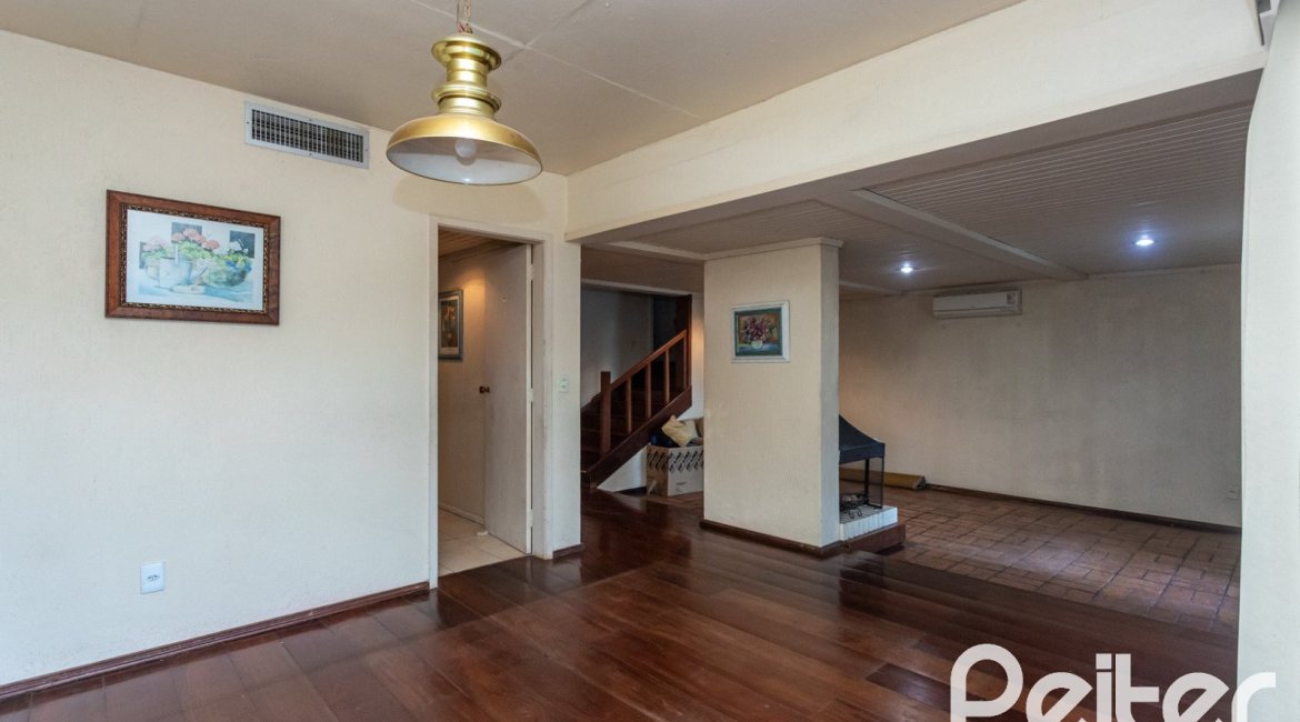 Casa em Condomínio à venda com 363m², 3 dormitórios, 2 suítes, 4 vagas, no bairro Cavalhada em PORTO ALEGRE