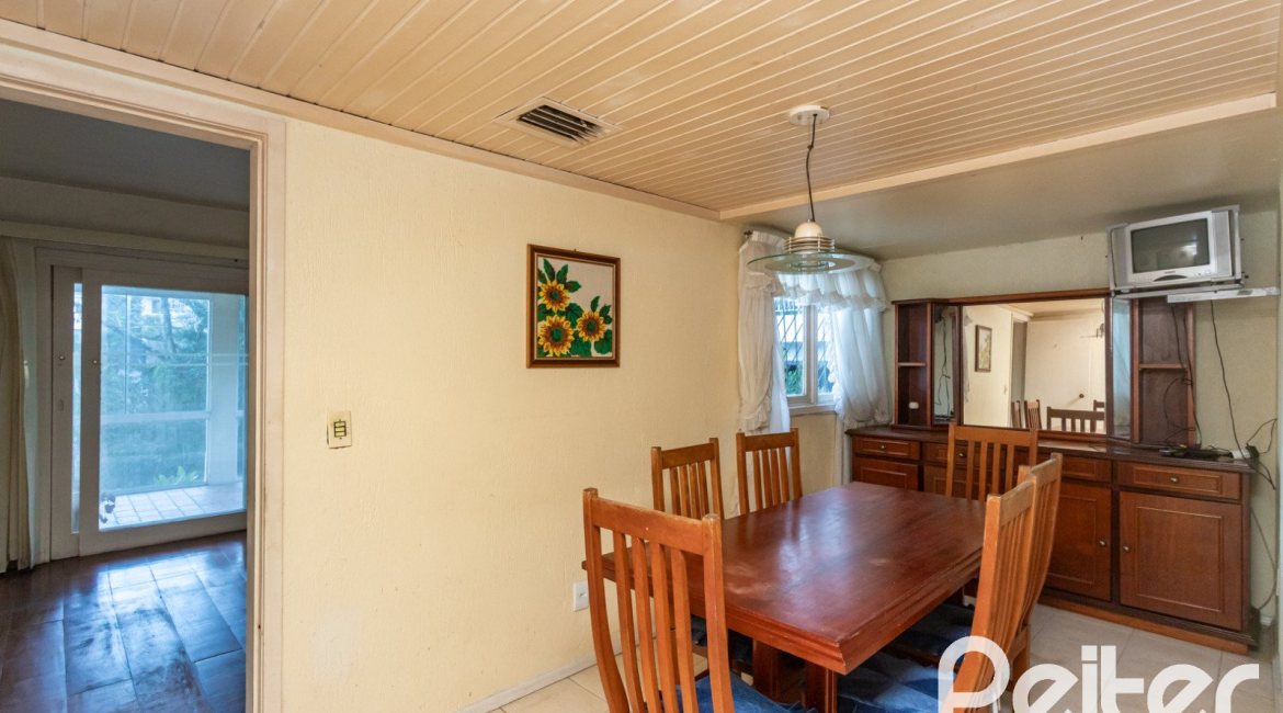 Casa em Condomínio à venda com 363m², 3 dormitórios, 2 suítes, 4 vagas, no bairro Cavalhada em PORTO ALEGRE