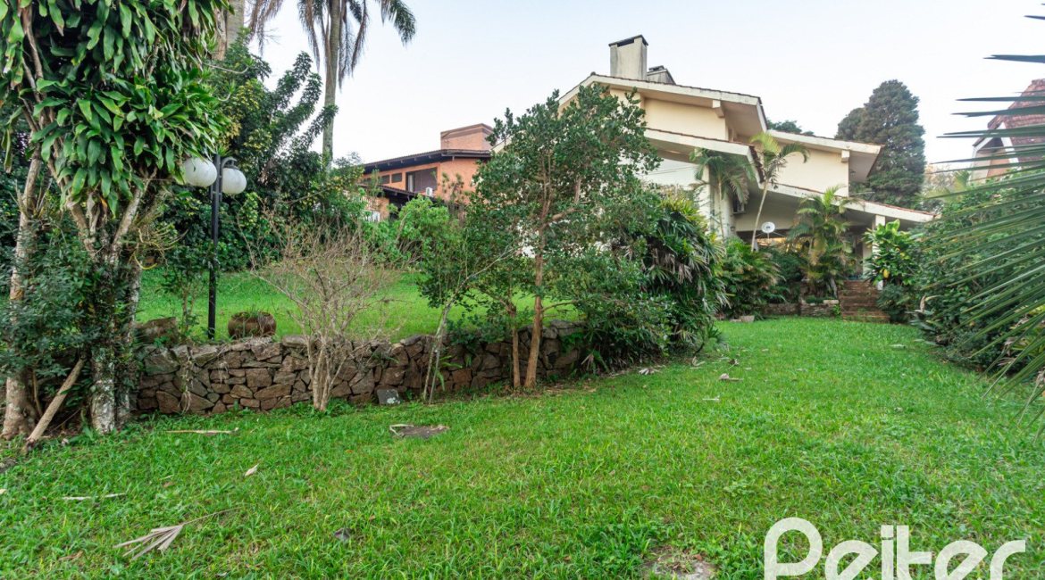 Casa em Condomínio à venda com 363m², 3 dormitórios, 2 suítes, 4 vagas, no bairro Cavalhada em PORTO ALEGRE