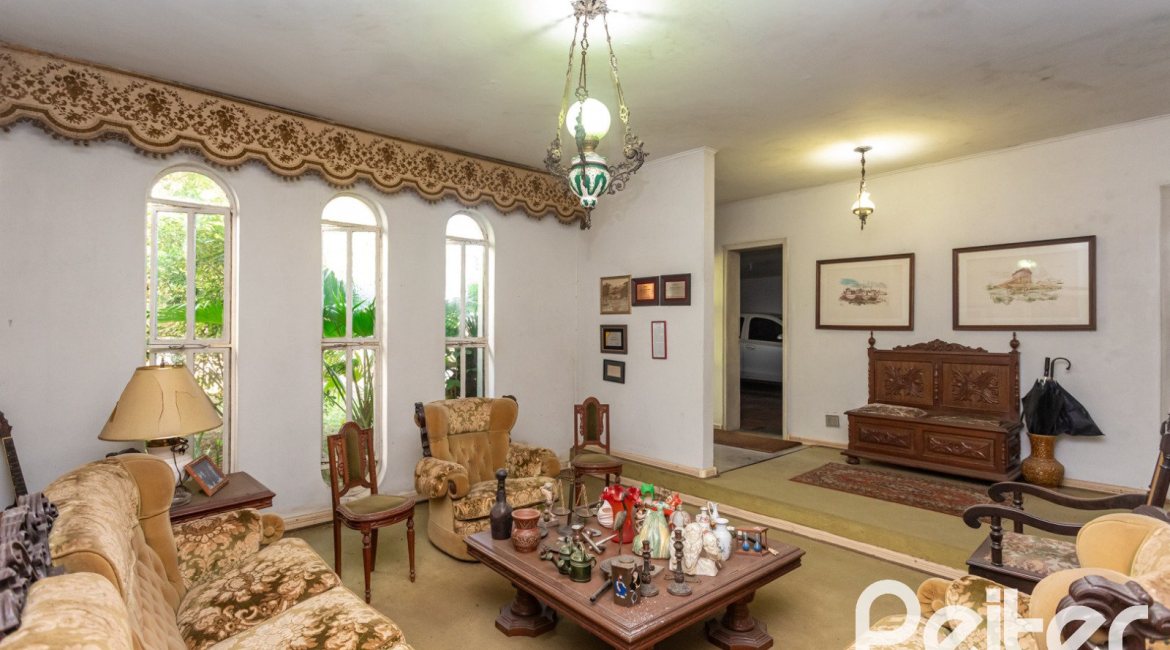 Casa em Condomínio à venda com 323m², 5 dormitórios, 1 suíte, 4 vagas, no bairro Tristeza em Porto Alegre