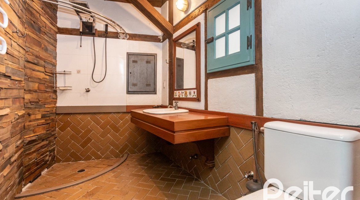 Casa em Condomínio à venda com 900m², 5 dormitórios, 5 suítes, 10 vagas, no bairro Cavalhada em PORTO ALEGRE