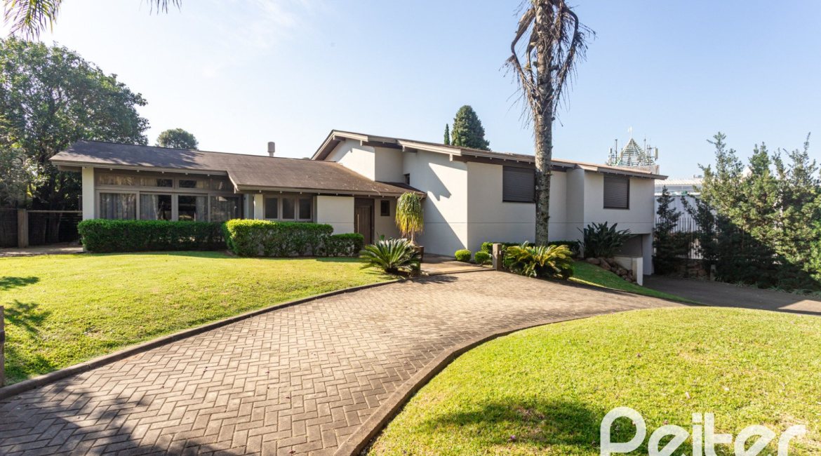 Casa em Condomínio à venda com 328m², 3 dormitórios, 2 suítes, 4 vagas, no bairro Cavalhada em PORTO ALEGRE