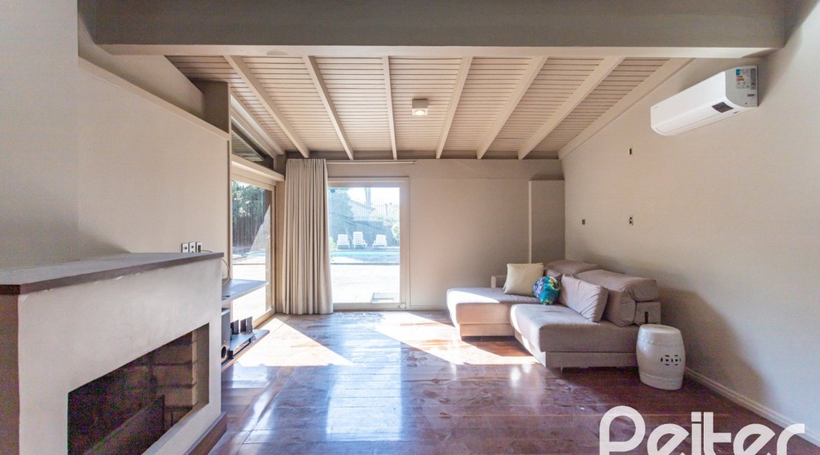 Casa em Condomínio à venda com 328m², 3 dormitórios, 2 suítes, 4 vagas, no bairro Cavalhada em PORTO ALEGRE