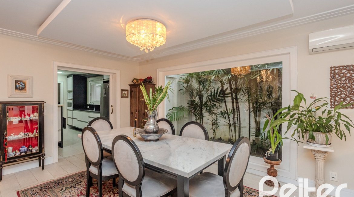 Casa em Condomínio à venda com 296m², 3 dormitórios, 1 suíte, 4 vagas, no bairro Terra Ville em PORTO ALEGRE