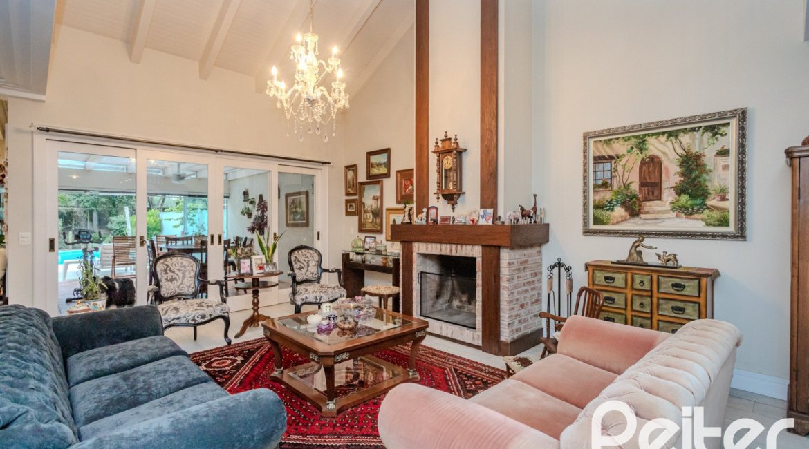 Casa em Condomínio à venda com 296m², 3 dormitórios, 1 suíte, 4 vagas, no bairro Terra Ville em PORTO ALEGRE
