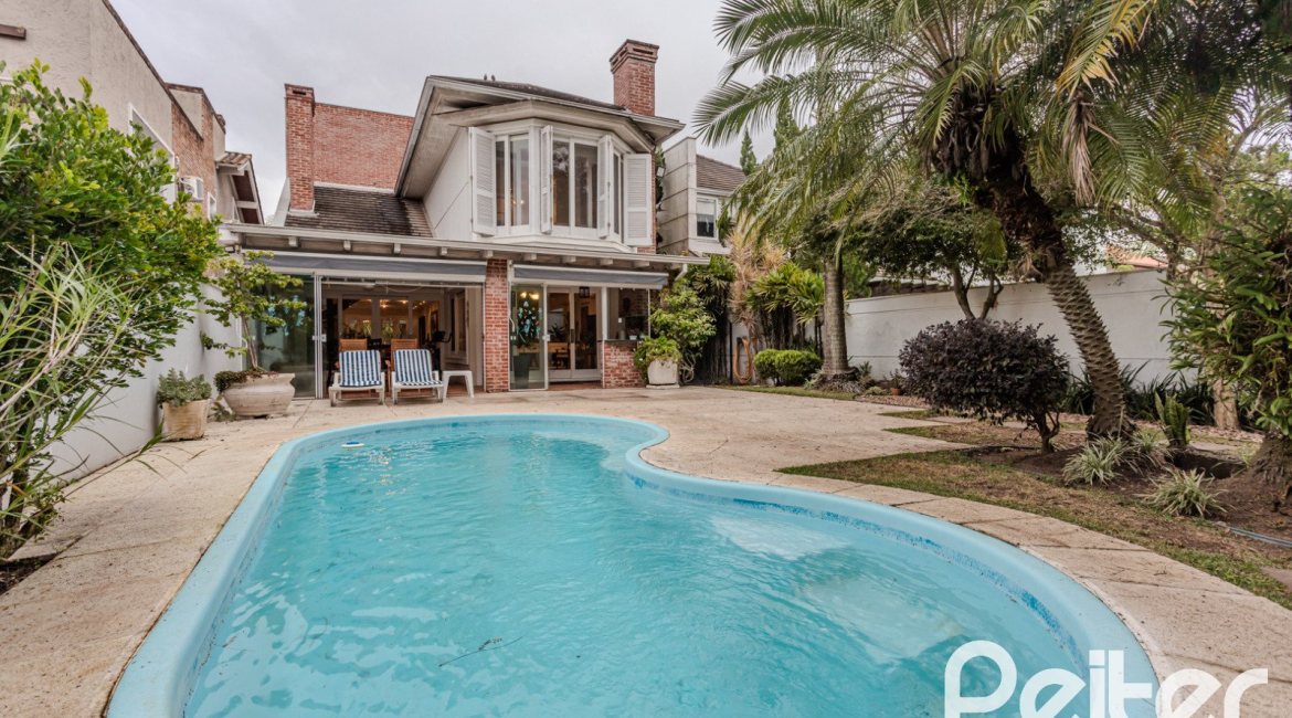 Casa em Condomínio à venda com 296m², 3 dormitórios, 1 suíte, 4 vagas, no bairro Terra Ville em PORTO ALEGRE