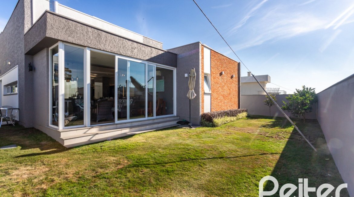 Casa em Condomínio à venda com 230m², 3 dormitórios, 3 suítes, 4 vagas, no bairro Alphaville em PORTO ALEGRE