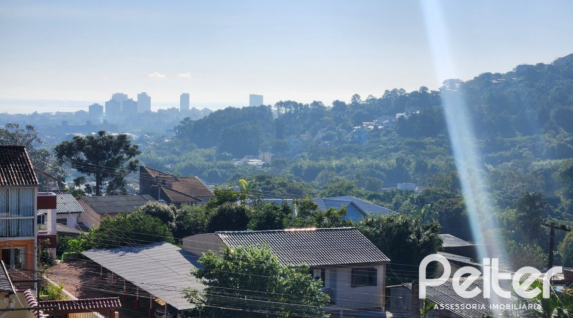 Casa em Condomínio à venda com 197m², 3 dormitórios, 1 suíte, 2 vagas, no bairro Vila Nova em PORTO ALEGRE
