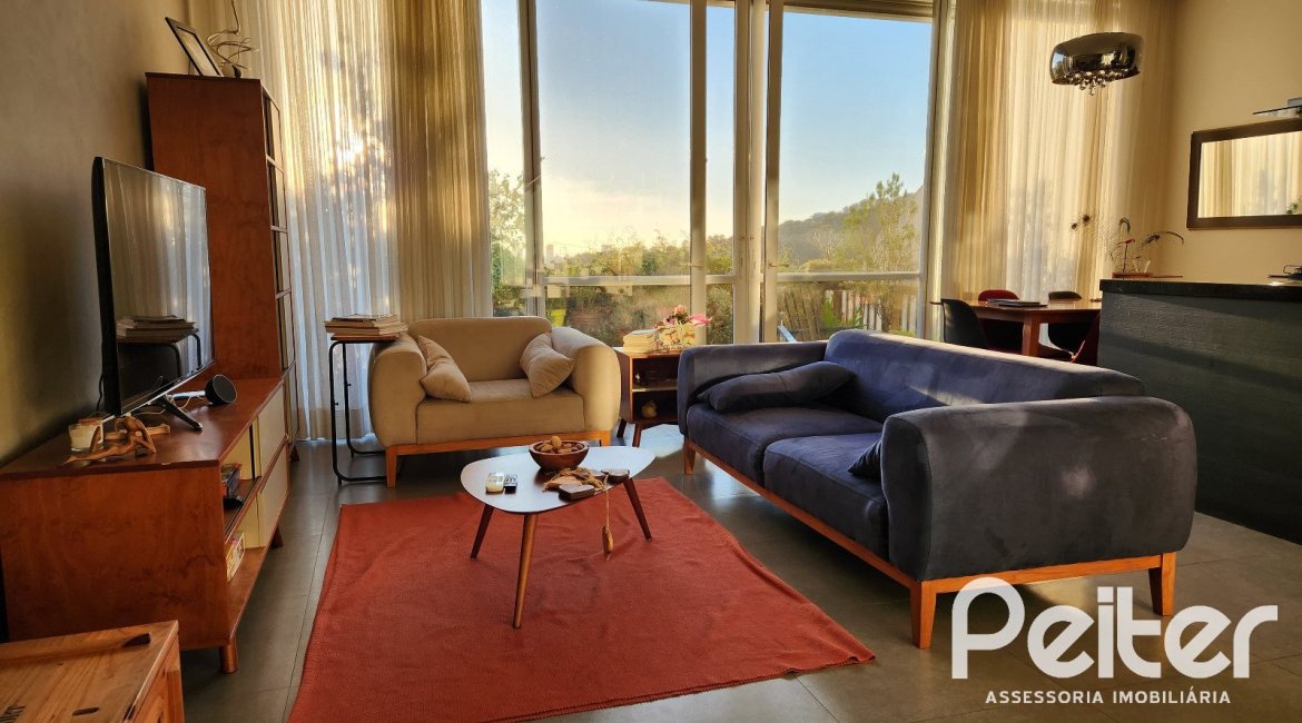 Casa em Condomínio à venda com 197m², 3 dormitórios, 1 suíte, 2 vagas, no bairro Vila Nova em PORTO ALEGRE