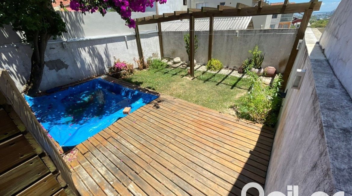 Casa em Condomínio à venda com 197m², 3 dormitórios, 1 suíte, 2 vagas, no bairro Vila Nova em PORTO ALEGRE