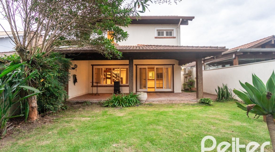 Casa em Condomínio à venda com 216m², 2 dormitórios, 2 suítes, 2 vagas, no bairro Terra Ville em PORTO ALEGRE
