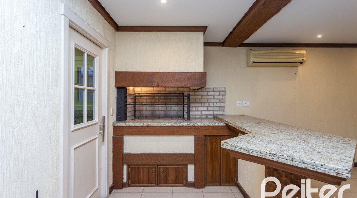 Casa em Condomínio à venda com 216m², 2 dormitórios, 2 suítes, 2 vagas, no bairro Terra Ville em PORTO ALEGRE