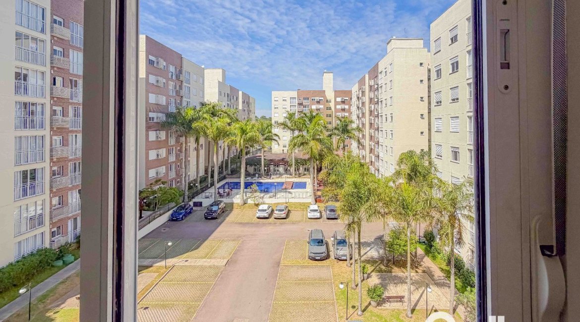 Apartamento à venda com 57m², 2 dormitórios, 1 suíte, 1 vaga, no bairro Vila Nova em PORTO ALEGRE