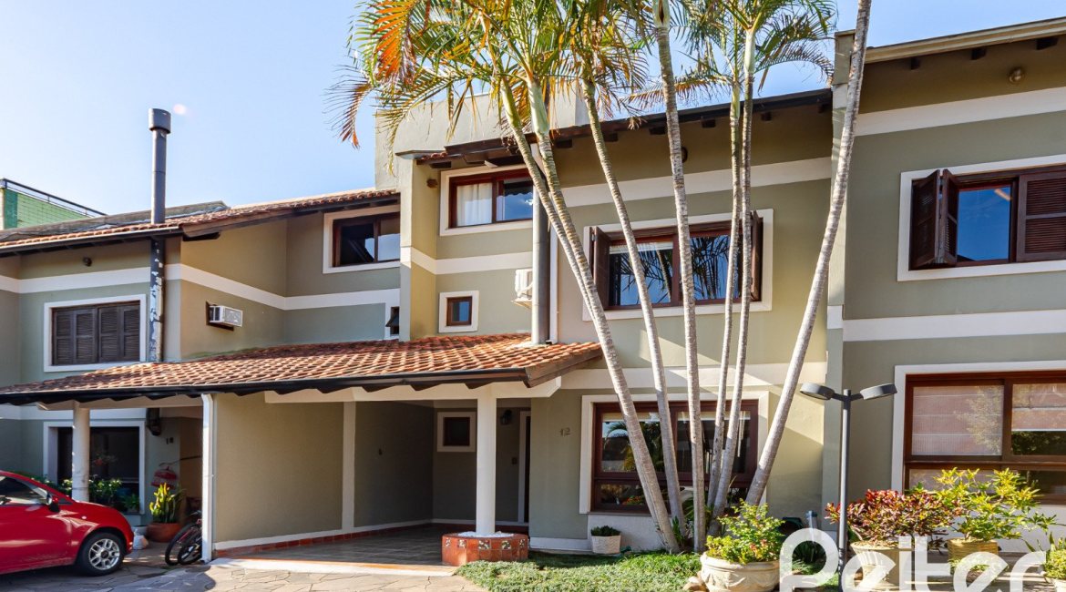 Casa em Condomínio à venda com 179m², 4 dormitórios, 1 suíte, 2 vagas, no bairro Cavalhada em Porto Alegre