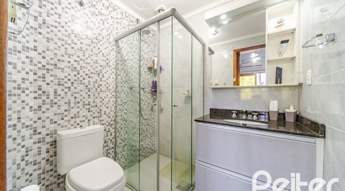 Casa em Condomínio à venda com 179m², 4 dormitórios, 1 suíte, 2 vagas, no bairro Cavalhada em Porto Alegre