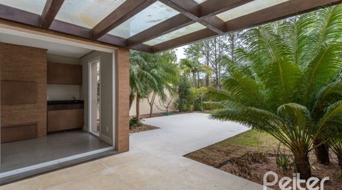 Casa em Condomínio à venda com 243m², 3 dormitórios, 3 suítes, 4 vagas, no bairro Terra Ville em PORTO ALEGRE