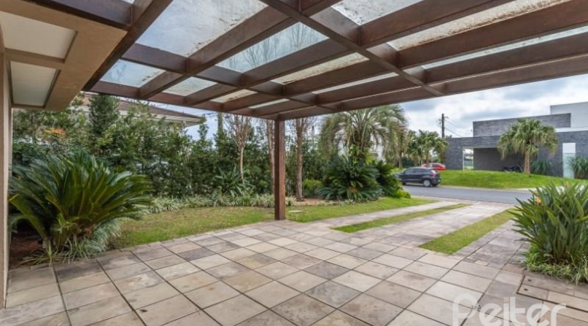 Casa em Condomínio à venda com 243m², 3 dormitórios, 3 suítes, 4 vagas, no bairro Terra Ville em PORTO ALEGRE