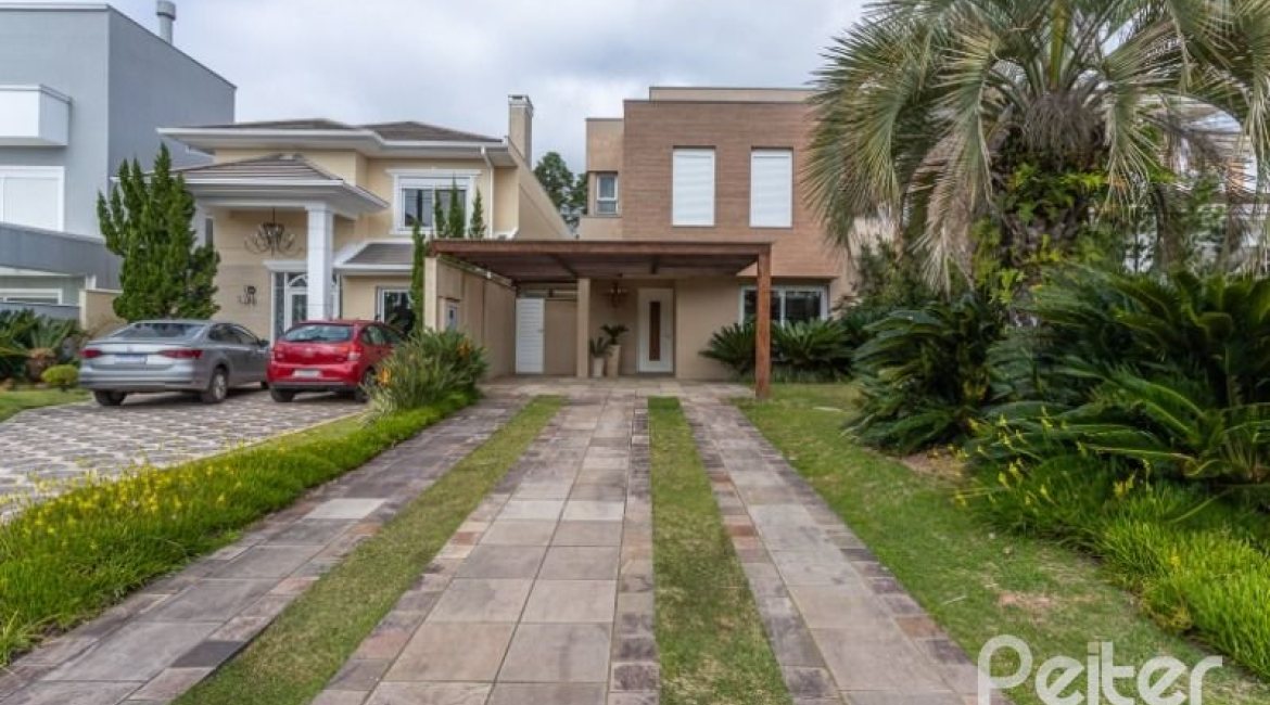 Casa em Condomínio à venda com 243m², 3 dormitórios, 3 suítes, 4 vagas, no bairro Terra Ville em PORTO ALEGRE