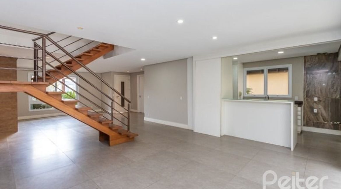 Casa em Condomínio à venda com 243m², 3 dormitórios, 3 suítes, 4 vagas, no bairro Terra Ville em PORTO ALEGRE