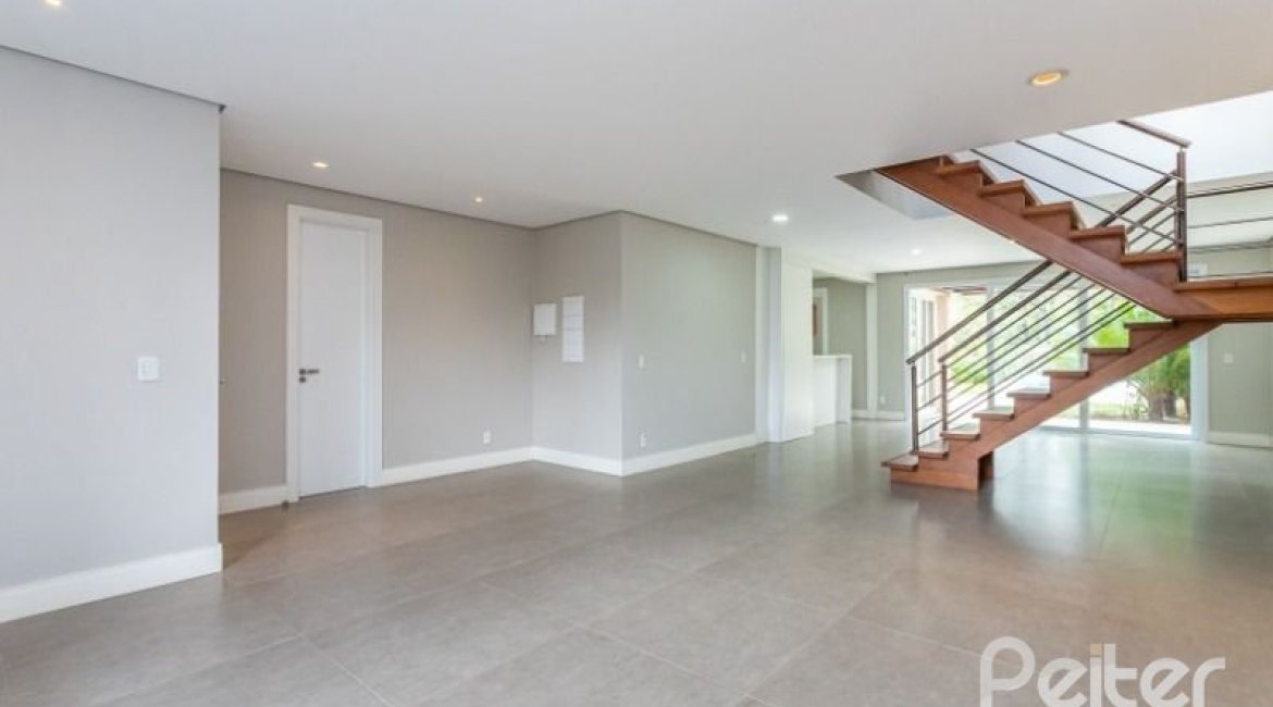 Casa em Condomínio à venda com 243m², 3 dormitórios, 3 suítes, 4 vagas, no bairro Terra Ville em PORTO ALEGRE