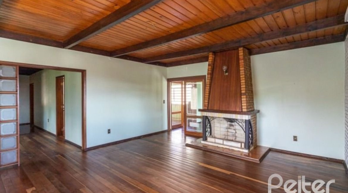 Casa à venda com 263m², 3 dormitórios, 2 suítes, 2 vagas, no bairro Jardim Isabel em Porto Alegre