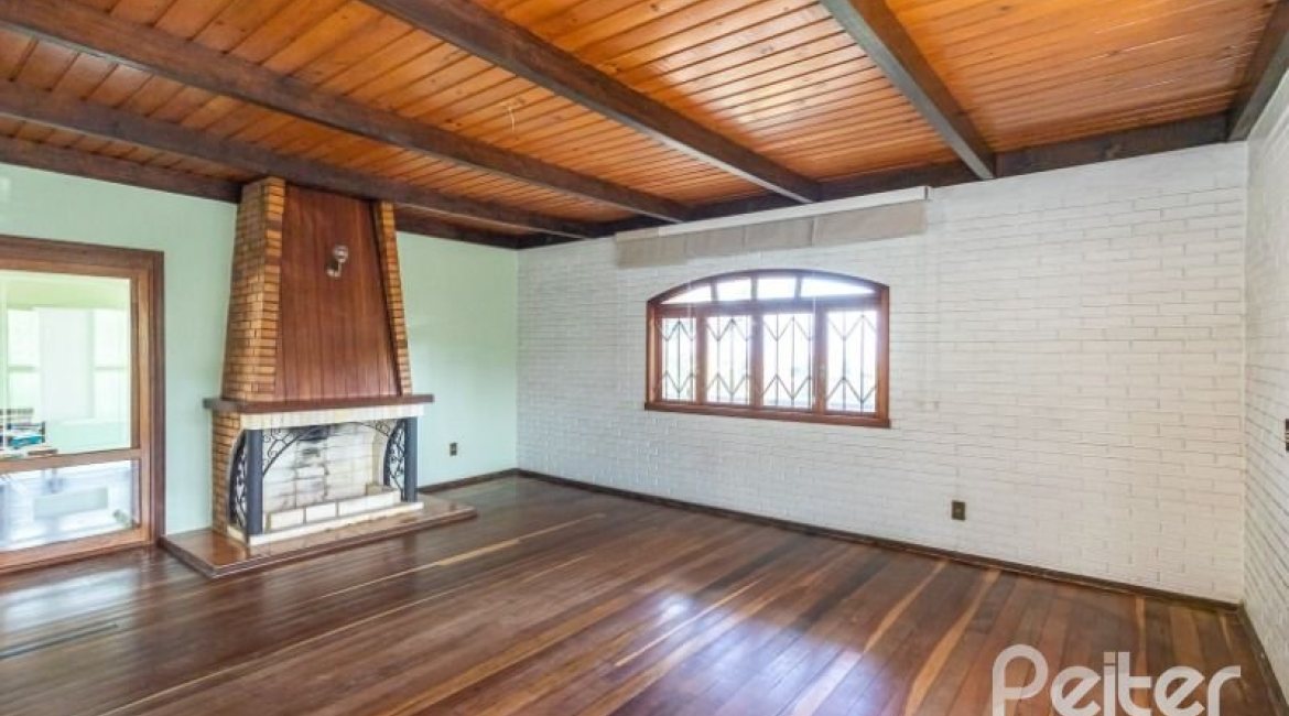 Casa à venda com 263m², 3 dormitórios, 2 suítes, 2 vagas, no bairro Jardim Isabel em Porto Alegre