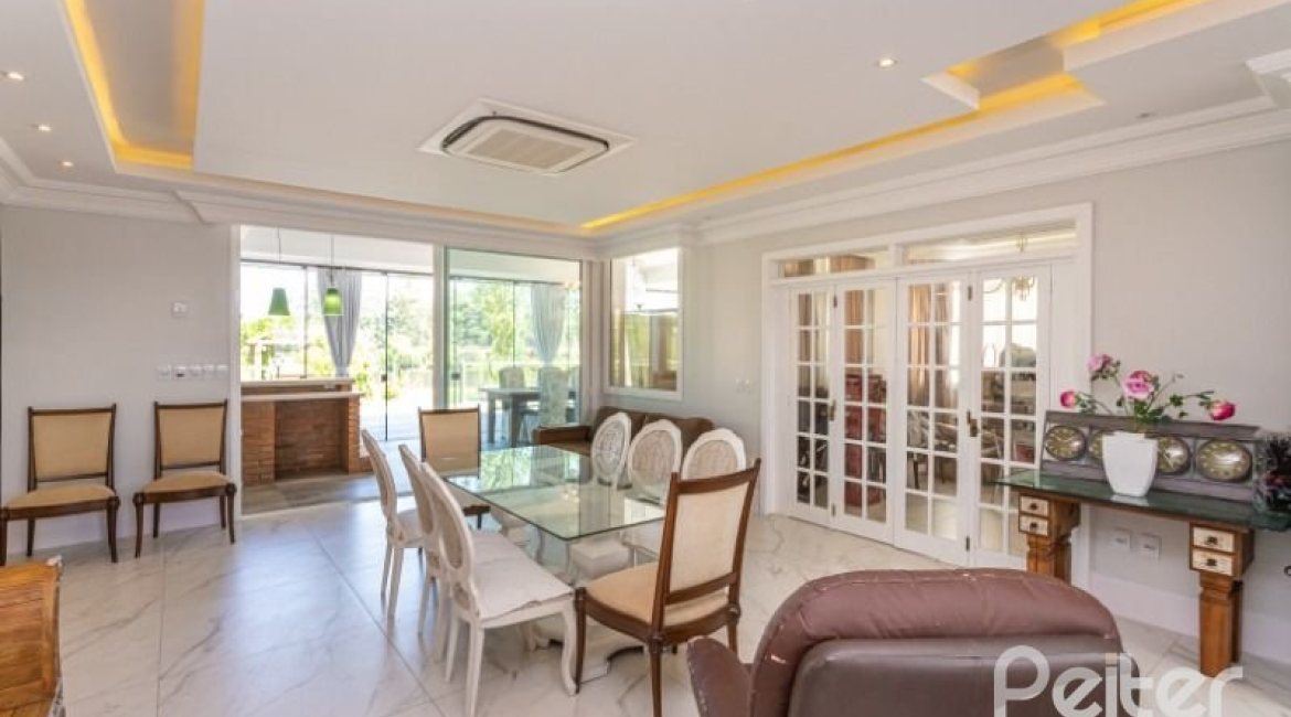 Casa em Condomínio à venda com 550m², 4 dormitórios, 4 suítes, 6 vagas, no bairro Terra Ville em Porto Alegre