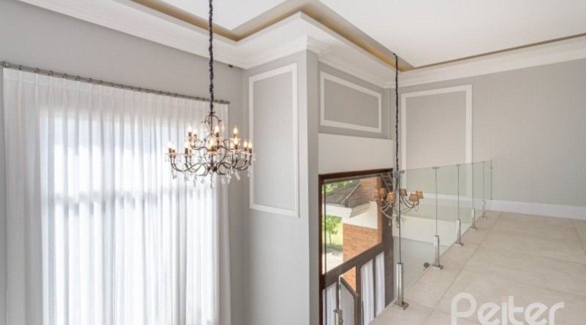 Casa em Condomínio à venda com 550m², 4 dormitórios, 4 suítes, 6 vagas, no bairro Terra Ville em Porto Alegre