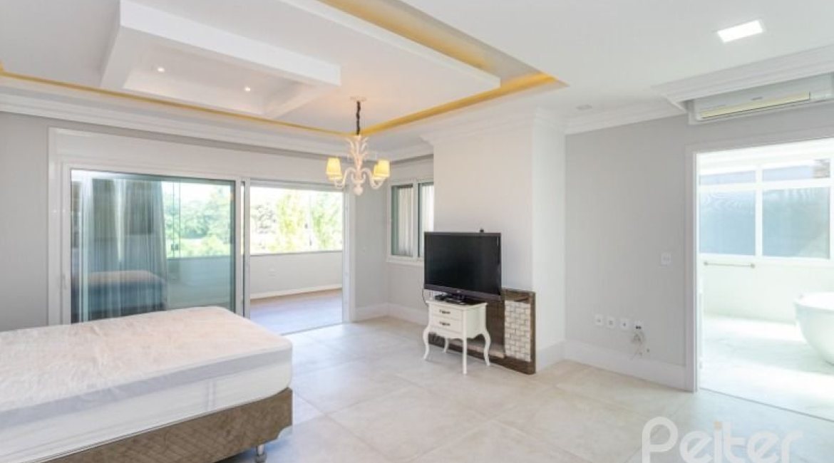 Casa em Condomínio à venda com 550m², 4 dormitórios, 4 suítes, 6 vagas, no bairro Terra Ville em Porto Alegre