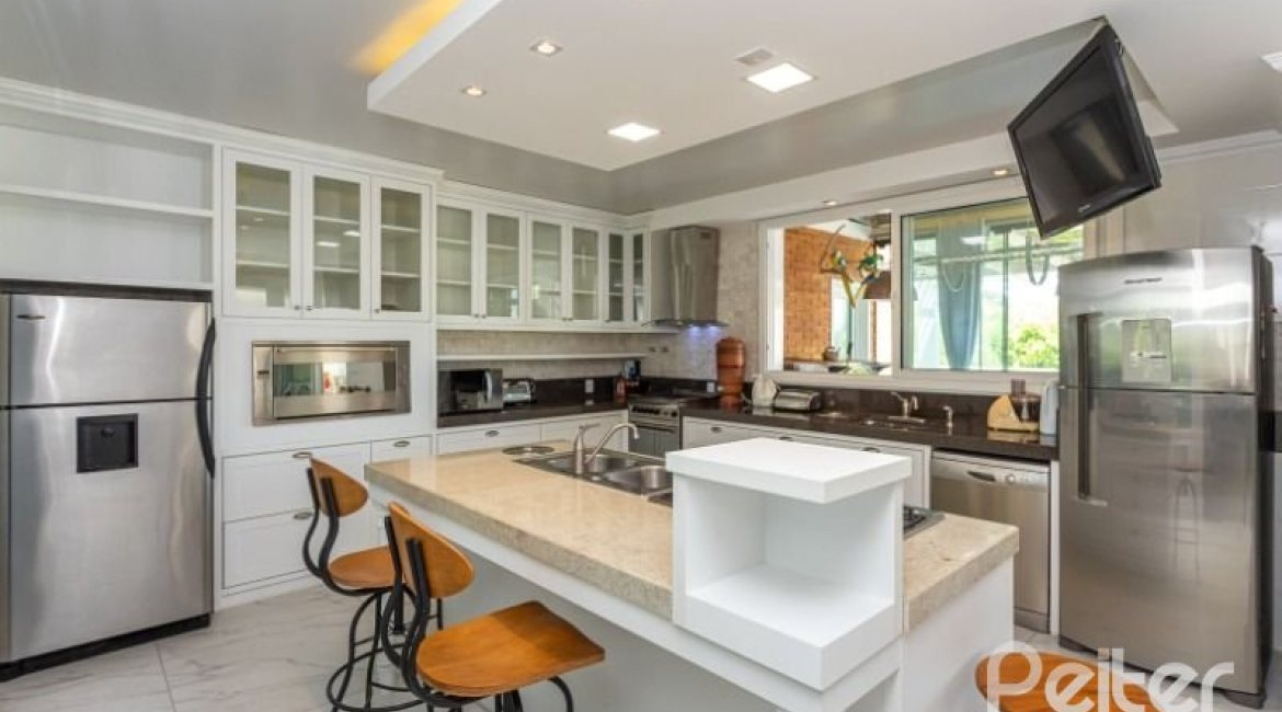 Casa em Condomínio à venda com 550m², 4 dormitórios, 4 suítes, 6 vagas, no bairro Terra Ville em Porto Alegre