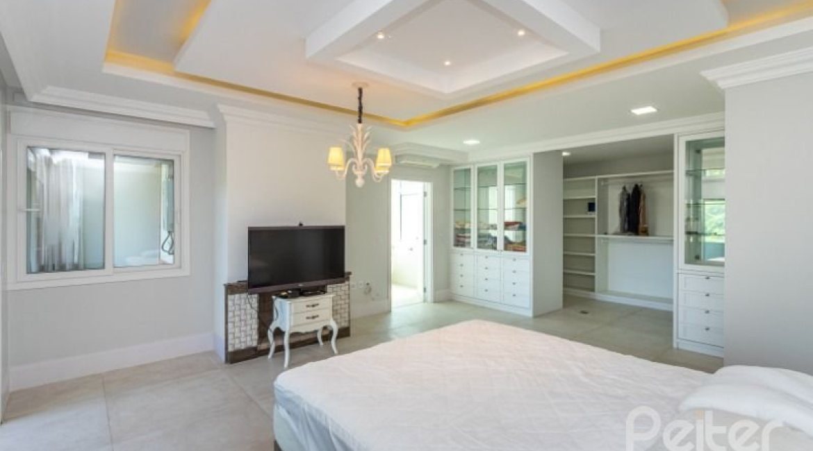 Casa em Condomínio à venda com 550m², 4 dormitórios, 4 suítes, 6 vagas, no bairro Terra Ville em Porto Alegre