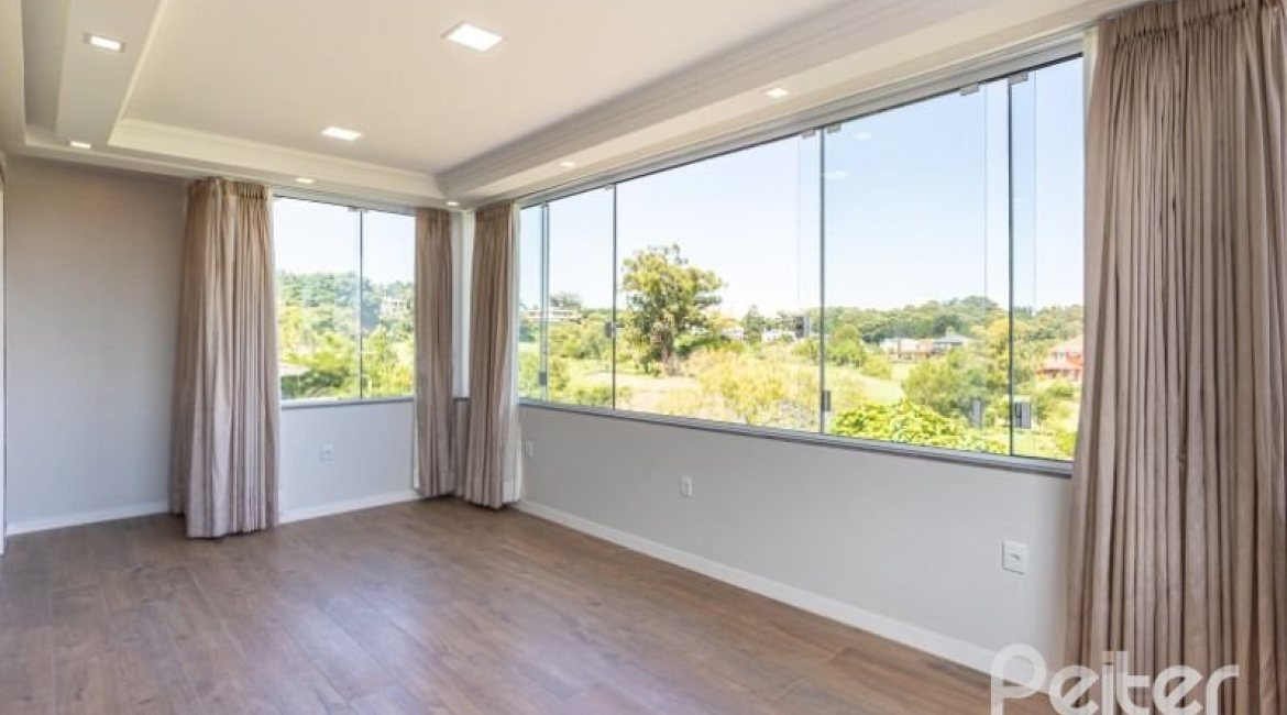 Casa em Condomínio à venda com 550m², 4 dormitórios, 4 suítes, 6 vagas, no bairro Terra Ville em Porto Alegre