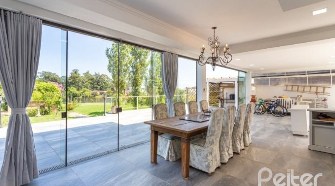 Casa em Condomínio à venda com 550m², 4 dormitórios, 4 suítes, 6 vagas, no bairro Terra Ville em Porto Alegre