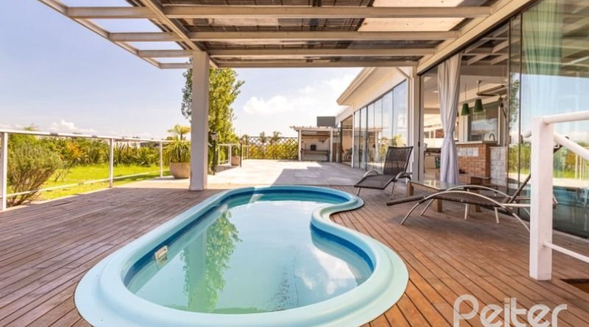 Casa em Condomínio à venda com 550m², 4 dormitórios, 4 suítes, 6 vagas, no bairro Terra Ville em Porto Alegre
