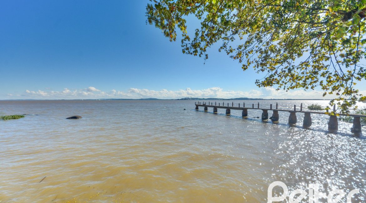 Casa à venda com 420m², 4 dormitórios, 3 suítes, 6 vagas, no bairro Vila Conceição em Porto Alegre